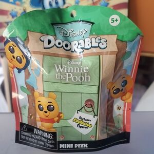 Disney Doorables Winnie the Pooh Mini Peek with Yellow and Brown